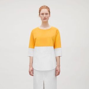 COS shirt hem sweater